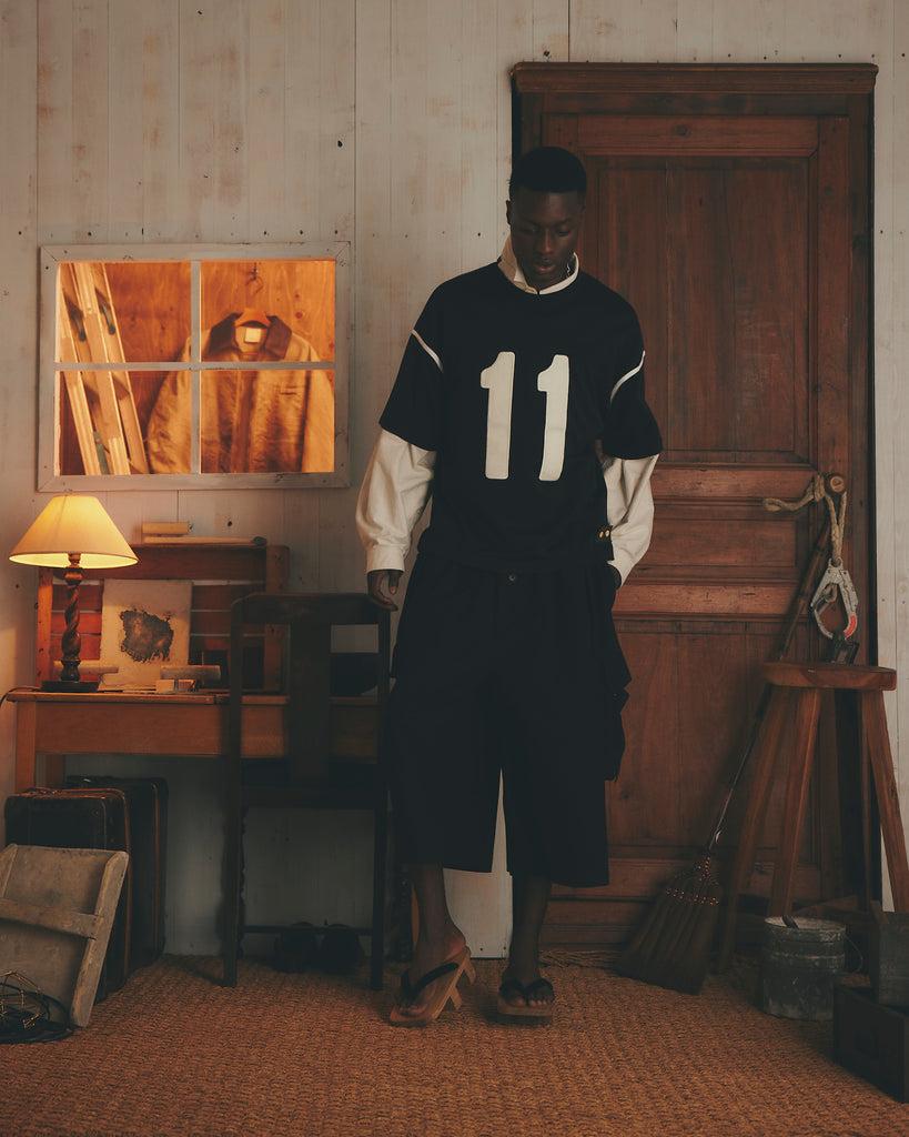 Anonymous Ism 11 - FOOTBALL TEE Refomed Black