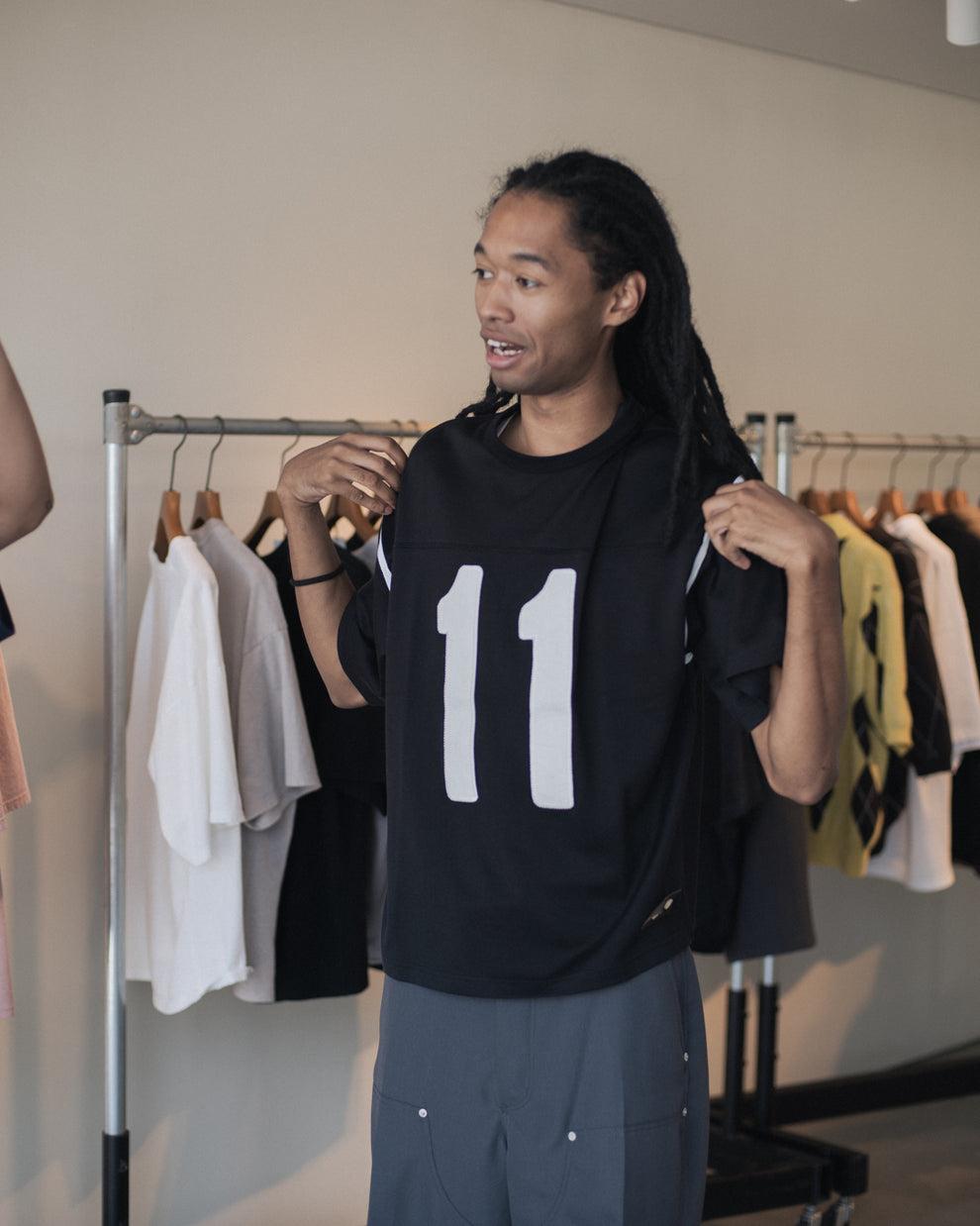 Anonymous Ism 11 - FOOTBALL TEE Refomed Black