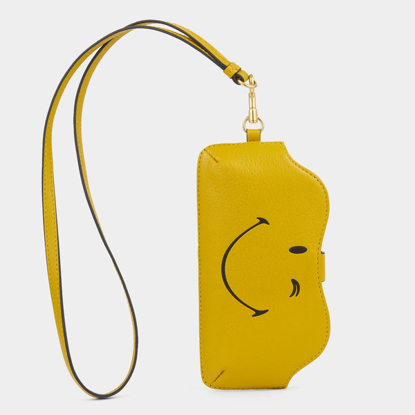 anya hindmarch Wink Sunglasses Holder Capra Leather in Mustard Yellow