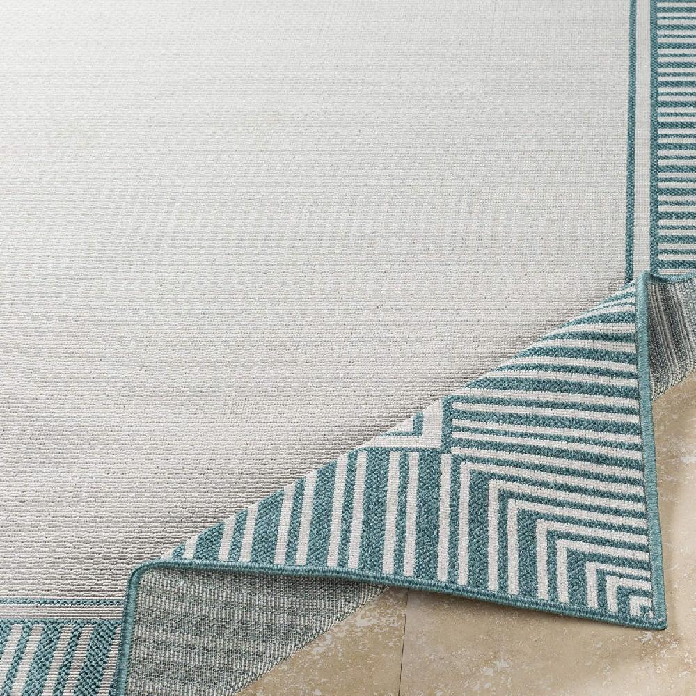 Artistic Weavers Livabliss Hampshire Solid Border Outdoor Area Rug 5’3″ X 7’7″ Black(Teal/White)