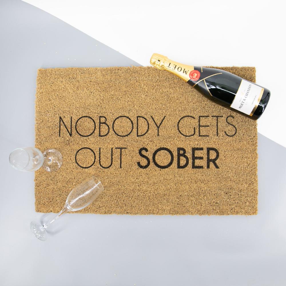artsy doormats Nobody Gets Out Sober Doormat