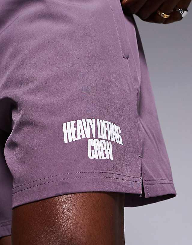 Asos 4505 7 Inch Wide Leg Quick Dry Graphic Training Shorts With Towel Loop And Zip Pockets In Grape