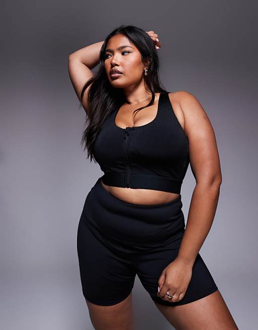 asos 4505 Curve Icon high support zip front sports bra with adjustable straps and removable padding in black high shine
