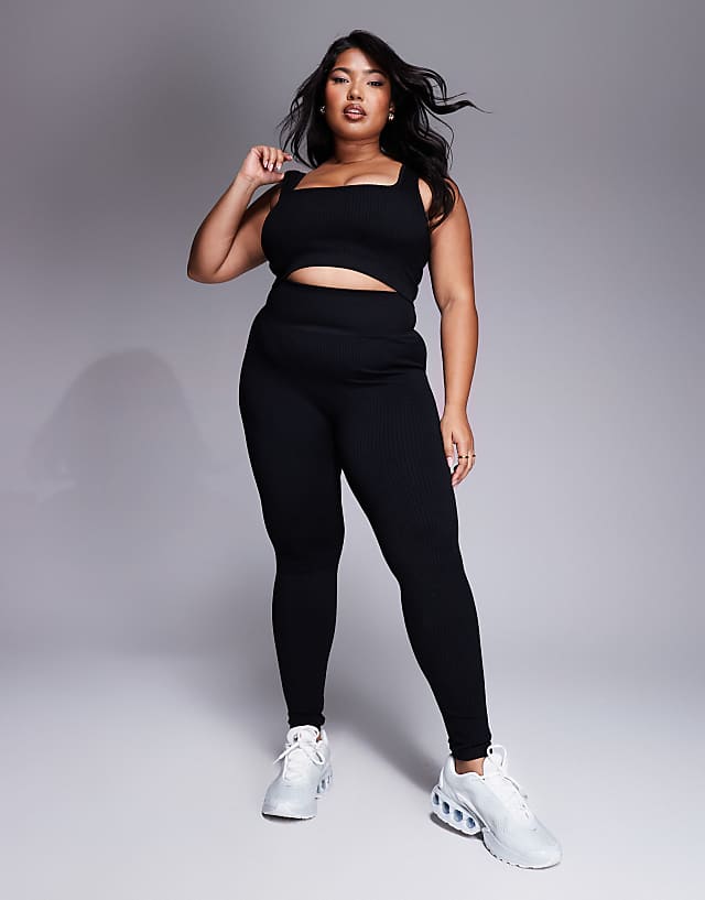 Asos 4505 Curve Icon Mid Impact Seamless Rib Sports Bra With Square Neck In Black