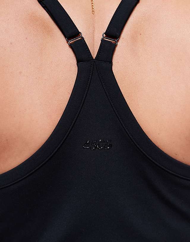 Asos 4505 Curve Icon Soft Touch Yoga Cami With Inner Bra And Adjustable Straps In Black