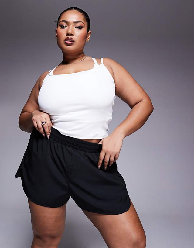 asos 4505 Curve Icon woven run short with zip pockets in black