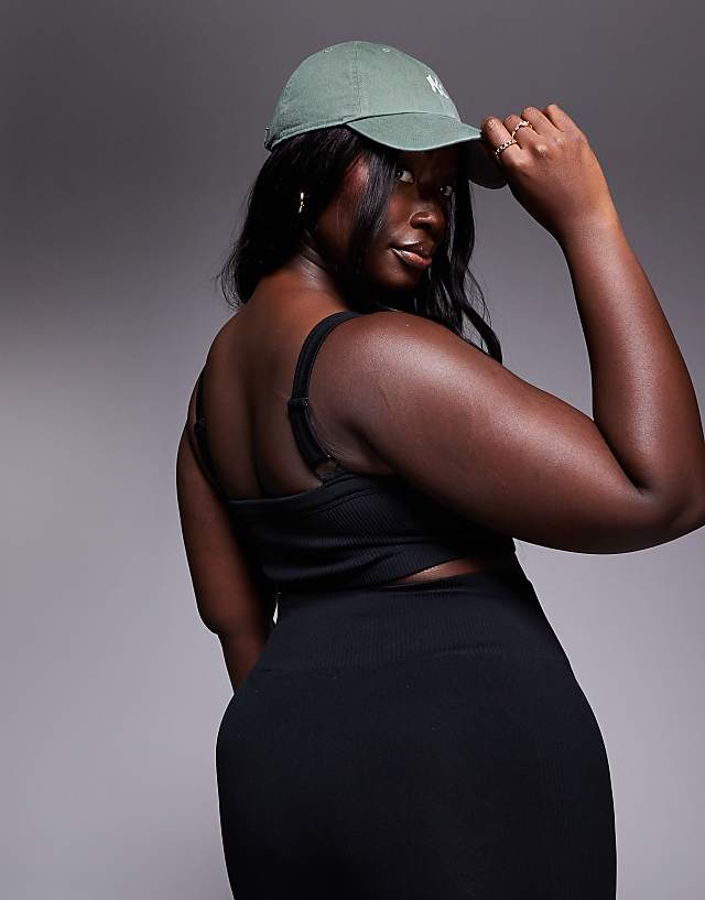 Asos 4505 Curve Sculpting Seamless Medium Support Sports Bra In Black
