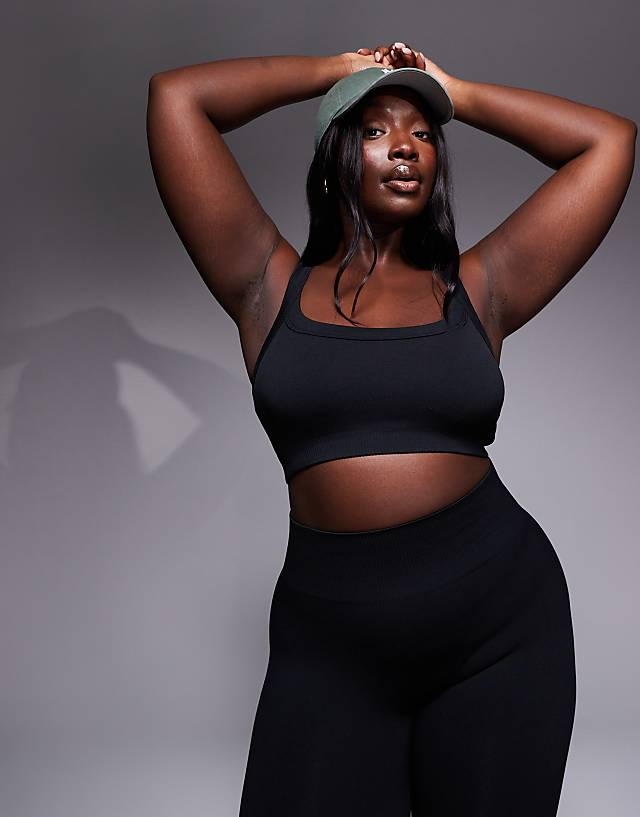 Asos 4505 Curve Sculpting Seamless Medium Support Sports Bra In Black