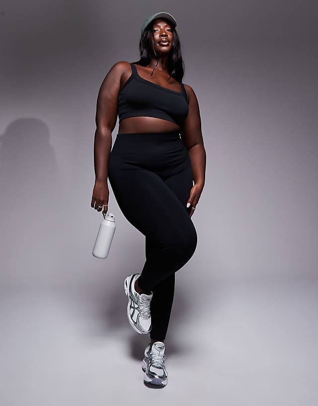 asos 4505 Curve sculpting seamless medium support sports bra in black