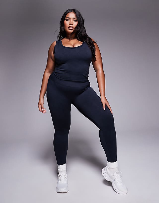 Asos 4505 Curve Seamless V Neck Vest With Inner Bra In Washed Black