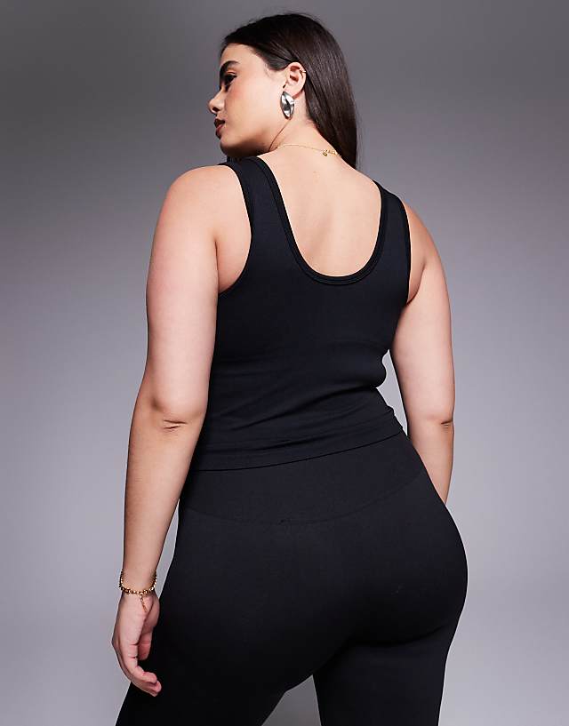 Asos 4505 Curve Smooth Seamless V Neck Vest With Inner Bra In Black