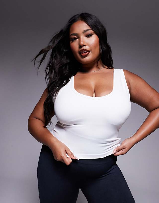 asos 4505 Curve smooth seamless V neck vest with inner bra in parchment
