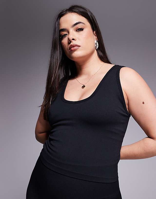 asos 4505 Curve smooth seamless V neck vest with inner bra in black
