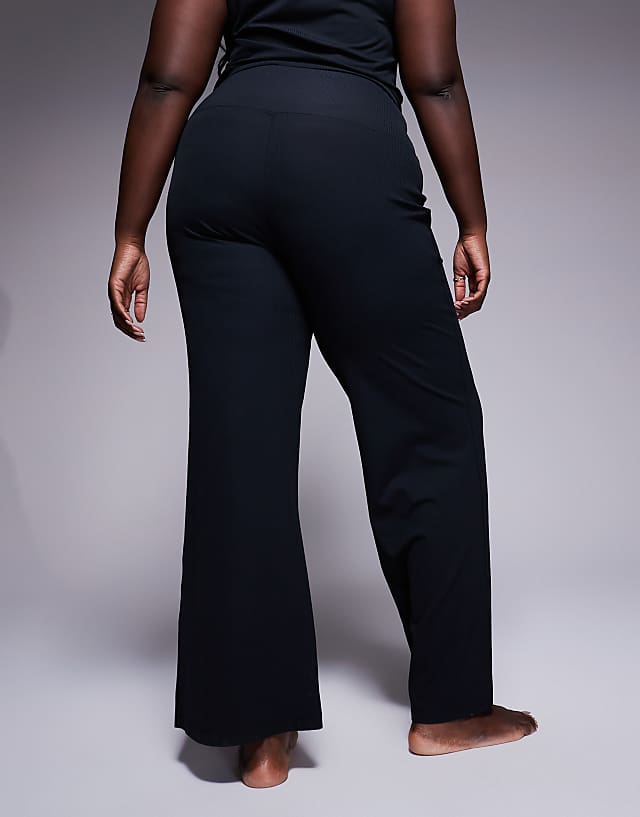 Asos 4505 Curve Soft Touch Rib Slim Kick Yoga Legging In Black