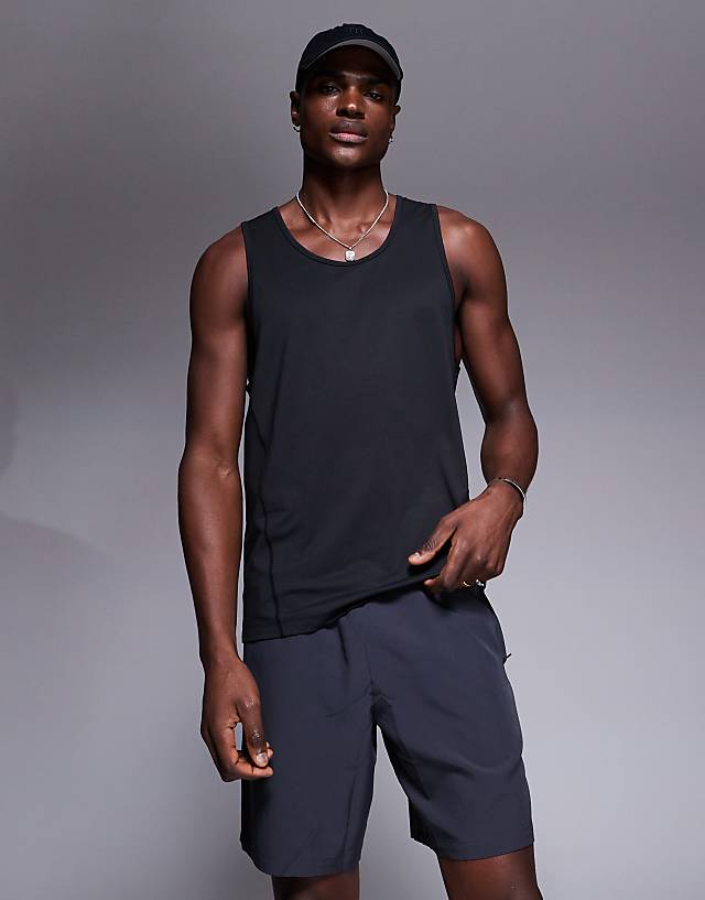 Asos 4505 Icon 7 Inch Quick Dry Training Shorts With Zip Pockets In Charcoal