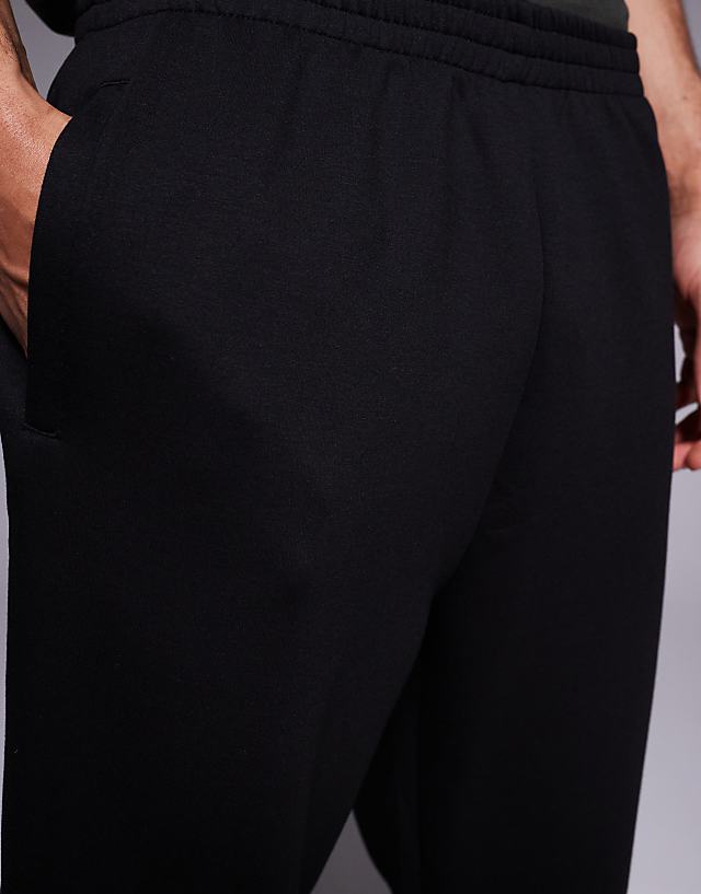 Asos 4505 Icon Quick Dry Tapered Fit Performance Joggers In Black