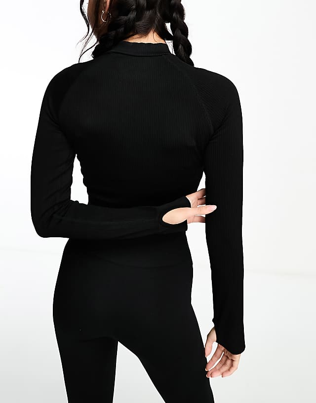 Asos 4505 Icon Seamless Rib 1/4 Zip Long Sleeve Top In Black