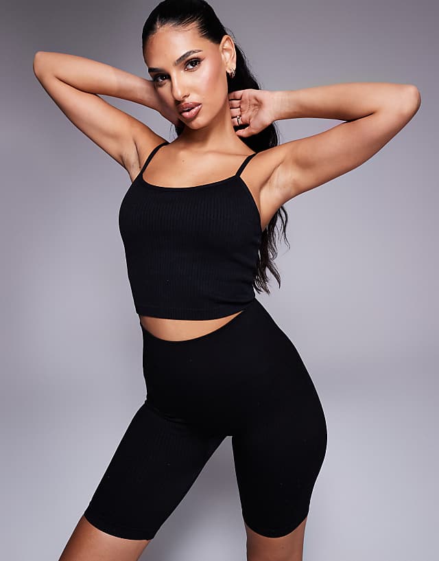 asos 4505 Icon seamless rib yoga vest with inner bra in black