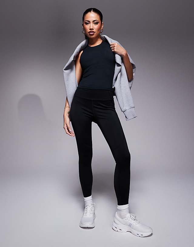 Asos 4505 Icon Soft Touch High Neck Vest With Inner Bra And Removable Padding In Black