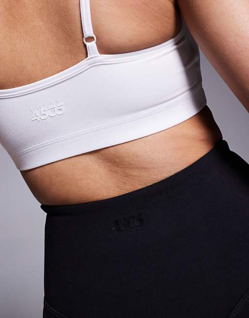 Asos 4505 Icon Soft Touch Light Support Sports Bra With Adjustable Straps In White