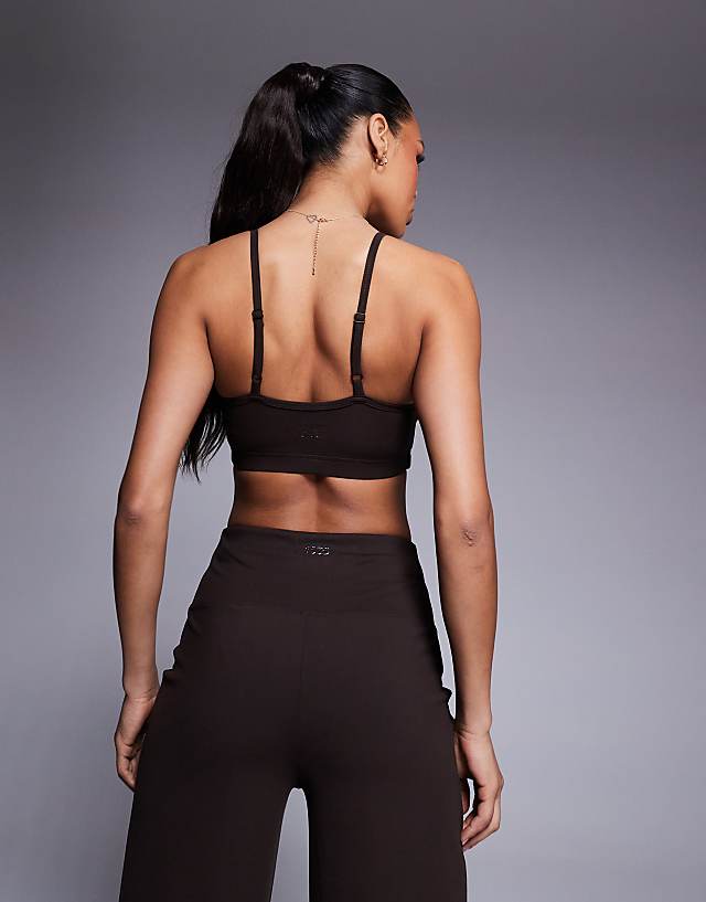 Asos 4505 Icon Soft Touch Light Support Sports Bra With Adjustable Straps In Chocolate