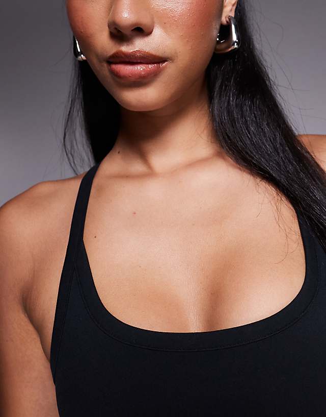 Asos 4505 Icon Soft Touch Yoga Cami With Inner Bra And Adjustable Straps In Black