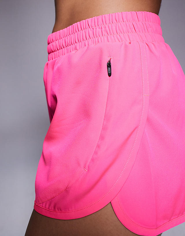 Asos 4505 Icon Woven Run Short With Zip Pockets In Bright Pink