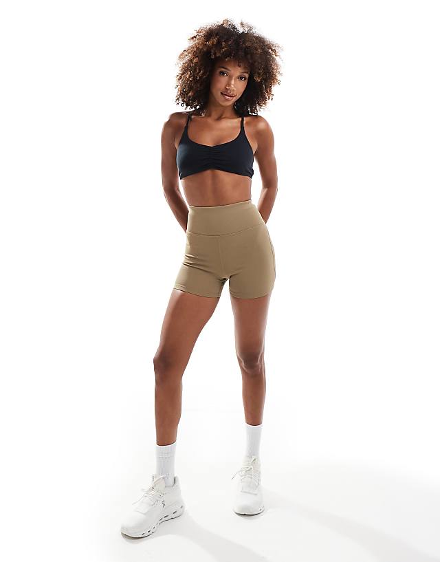 Asos 4505 Light Support Ruched Front Strap Back Sports Bra In Black