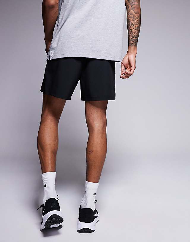 Asos 4505 Loose Fit Quick Dry Graphic Training Shorts With Zip Pockets In Black