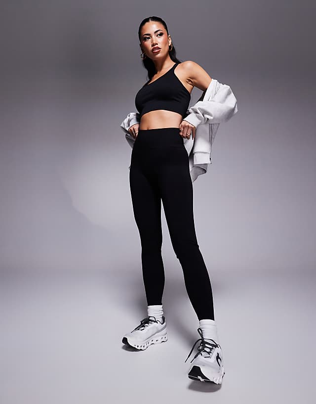 Asos 4505 Seamless Multi Strap Medium Support Sports Bra With Removable Padding In Black