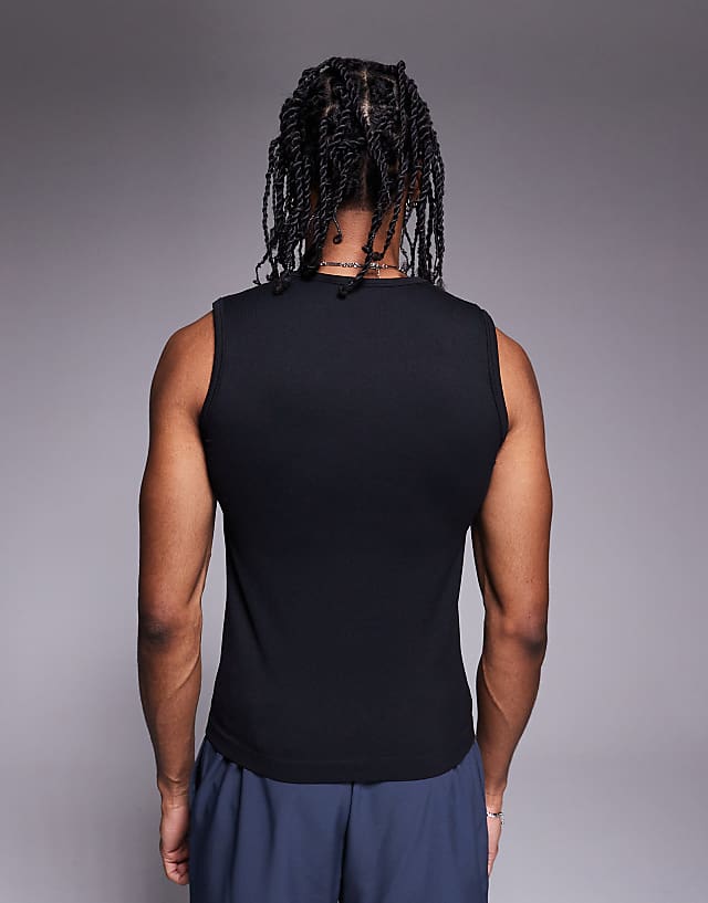 Asos 4505 Slim Fit Seamless Ribbed Training Tank In Black