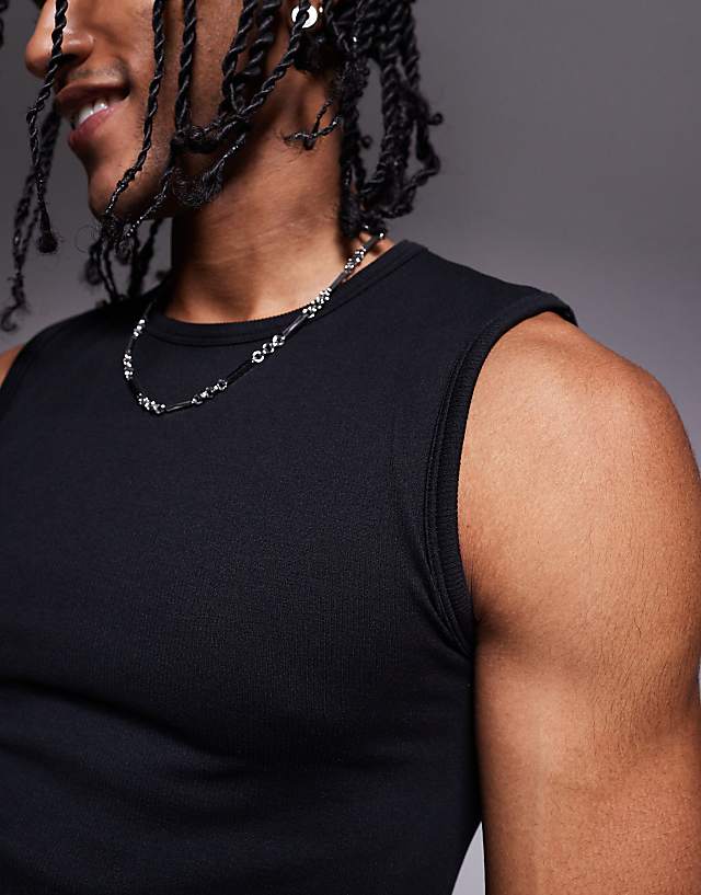 Asos 4505 Slim Fit Seamless Ribbed Training Tank In Black