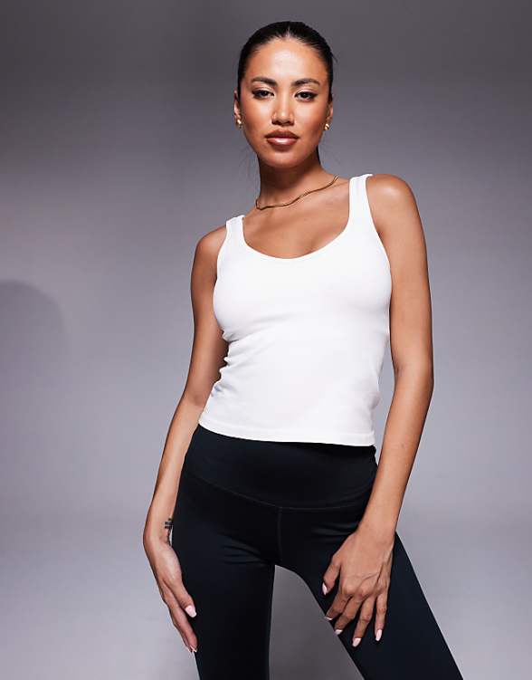 asos 4505 smooth seamless V neck vest with inner bra in parchment