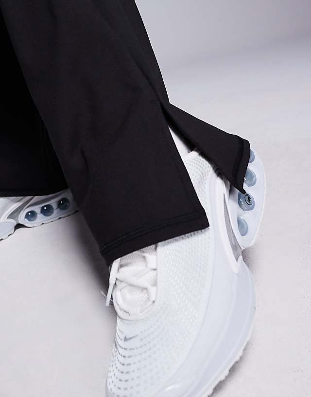 Asos 4505 Soft Touch Slim Kick Yoga Legging With Hem Split In Black