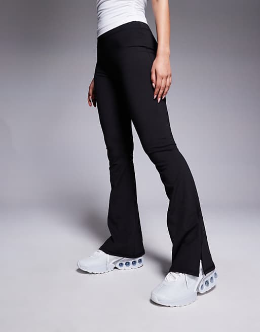 Asos 4505 Soft Touch Slim Kick Yoga Legging With Hem Split In Black