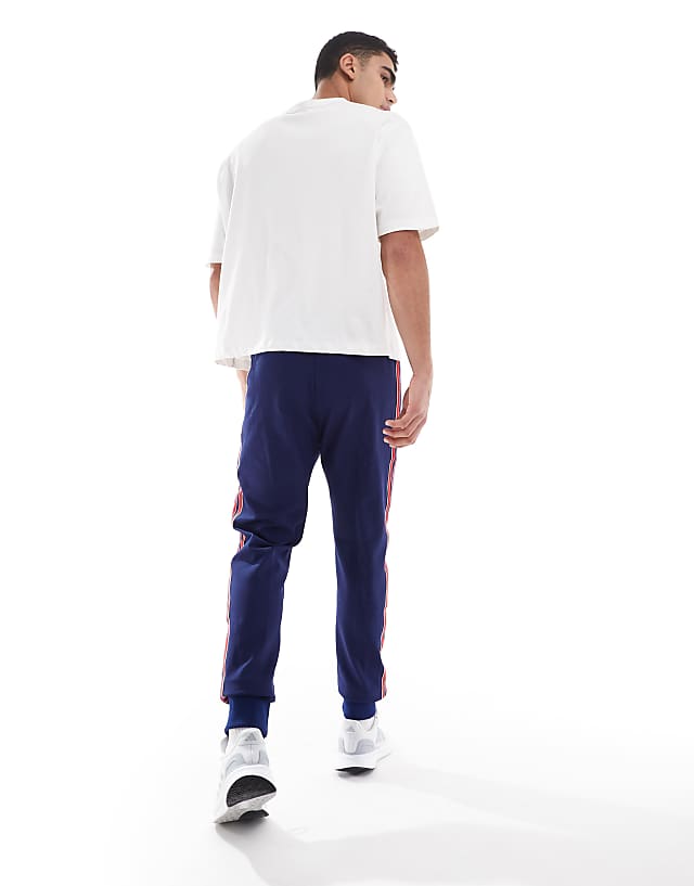 Asos Adidas Football Arsenal Icons Trackpants In Navy And Red