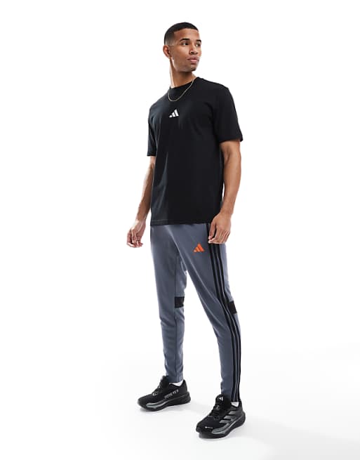 asos adidas Football Tiro essentials 3 stripe joggers in navy
