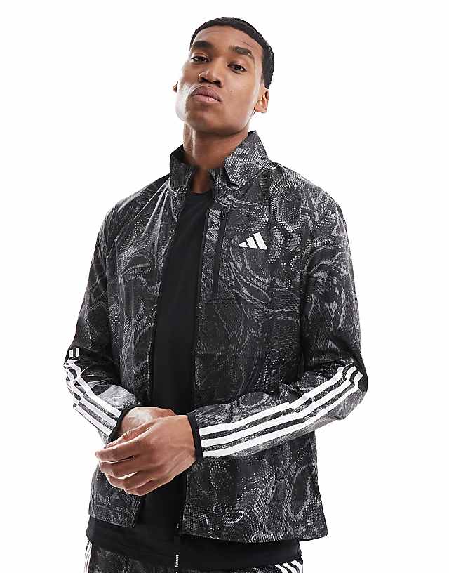 asos adidas Running Own the Run all over print jacket in black