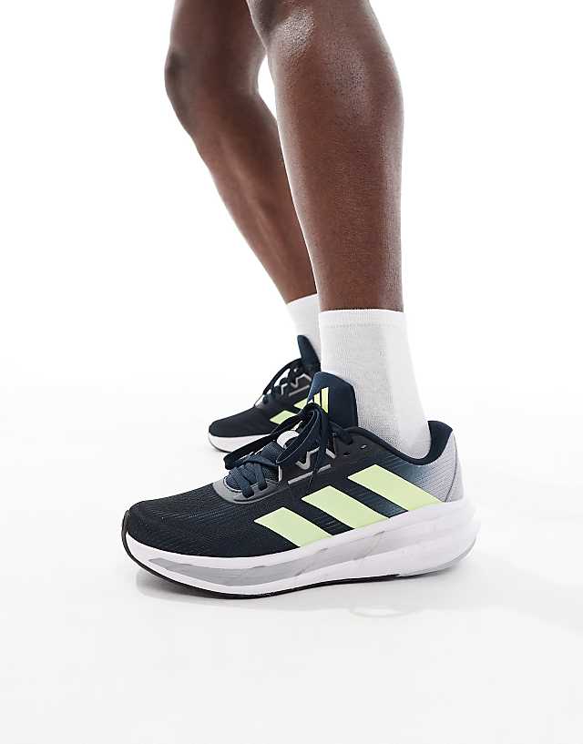asos adidas Running Questar 3 trainers in navy and yellow