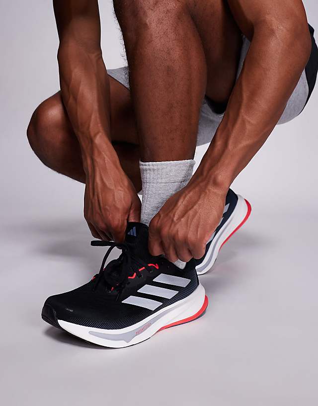 asos adidas Running Supernova Rise 2 trainers in black grey and red