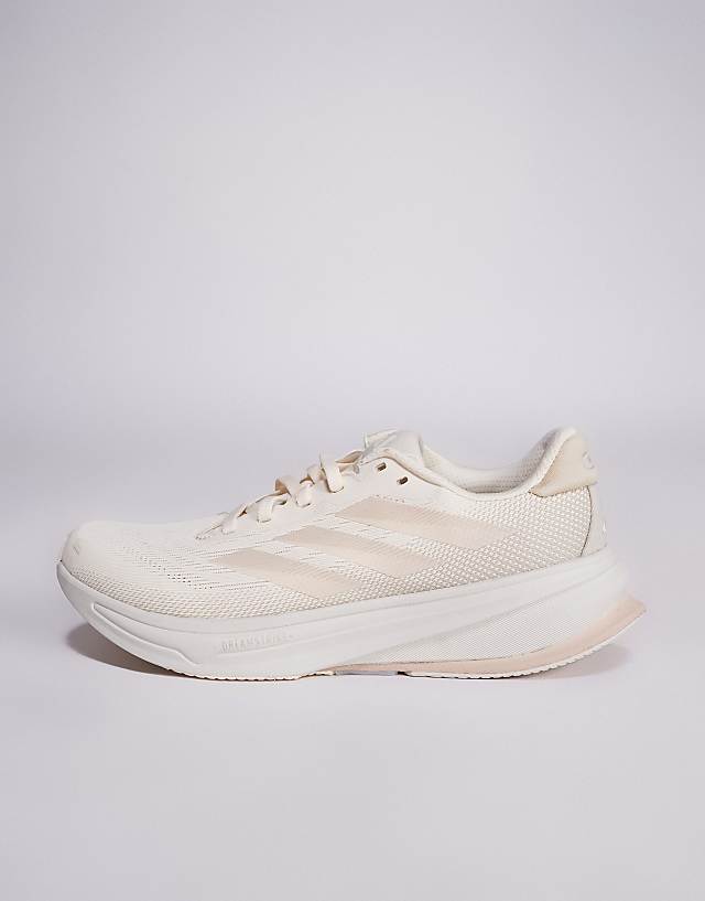 Asos Adidas Running Supernova Rise 2 Trainers In White And Beige