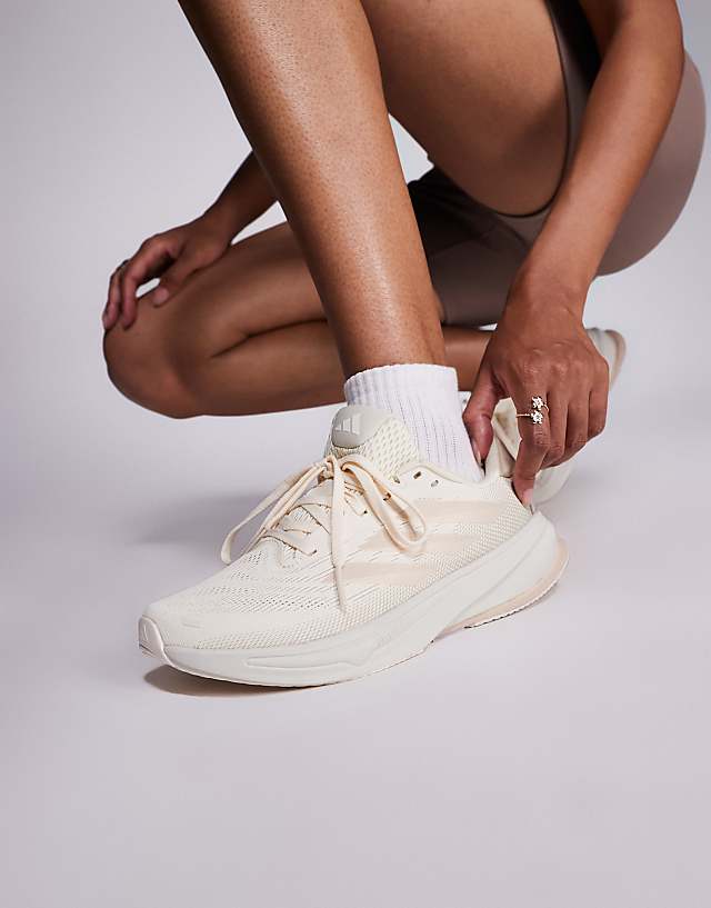 asos adidas Running Supernova Rise 2 trainers in white and beige
