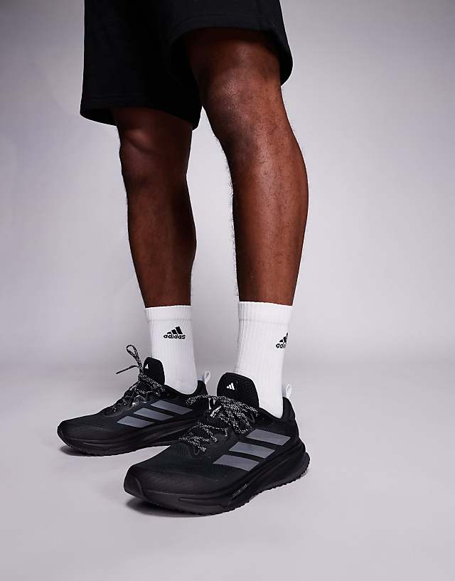 asos adidas Running Supernova Rise ATR in black and metallic silver