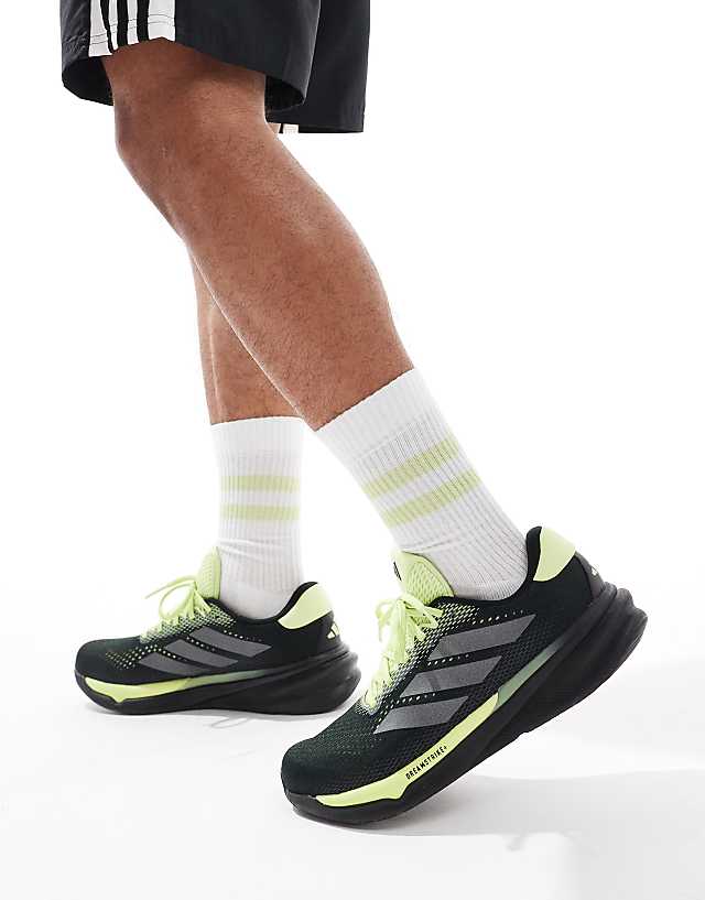 asos adidas Running Supernova Stride 2 in black and lime