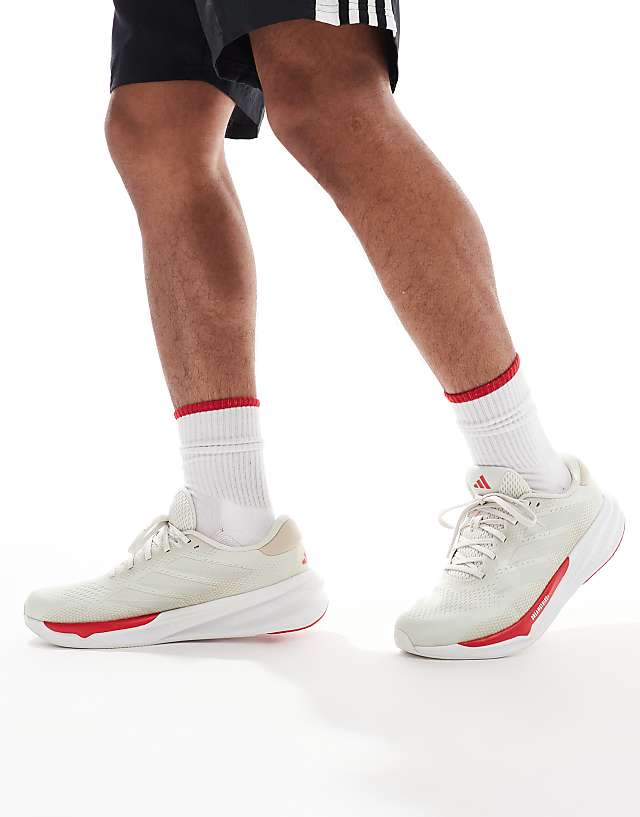 asos adidas Running Supernova Stride 2 in white and red