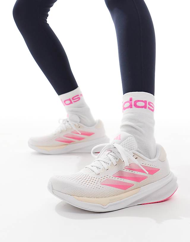asos adidas Running Supernova Stride 2 in white peach and pink