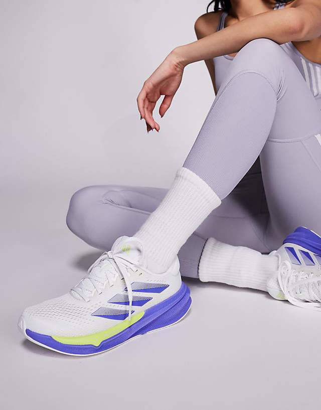asos adidas Running Supernova Stride 2 trainers in white silver and purple