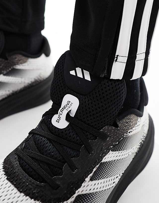 Asos Adidas Running Supernova Stride Trainers In Black