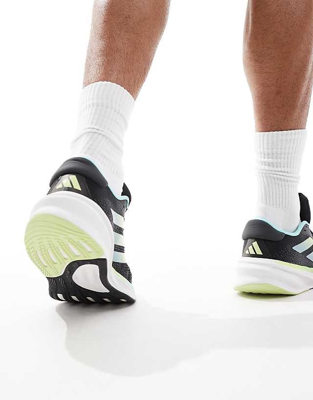 Asos Adidas Running Supernova Stride Trainers In Black And Aqua