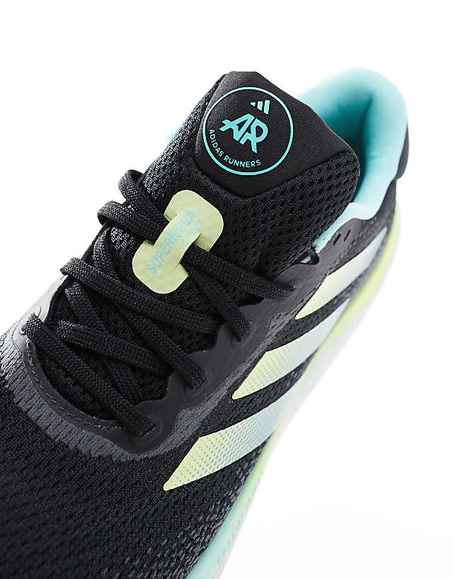 Asos Adidas Running Supernova Stride Trainers In Black And Aqua